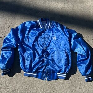 Men’s ups blue satin jacket with auburn tag size large.